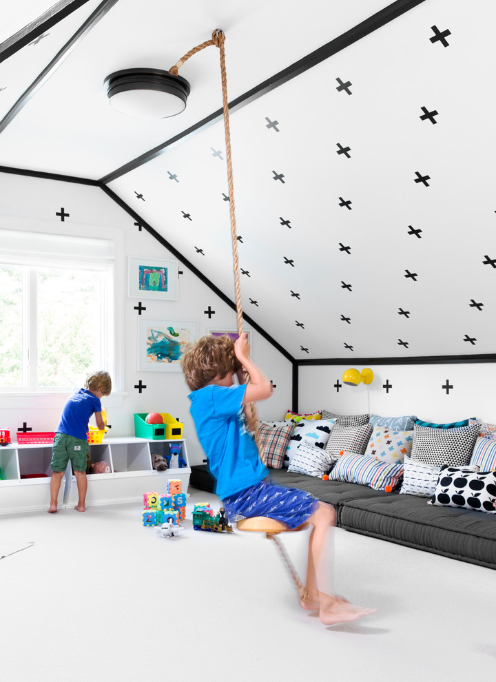 Contemporary gender neutral kids' bedroom in New York with white walls and carpet.