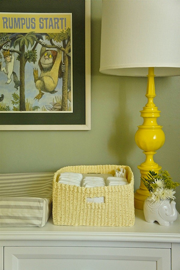 This is an example of a medium sized traditional gender neutral kids' bedroom in Los Angeles with green walls and carpet.