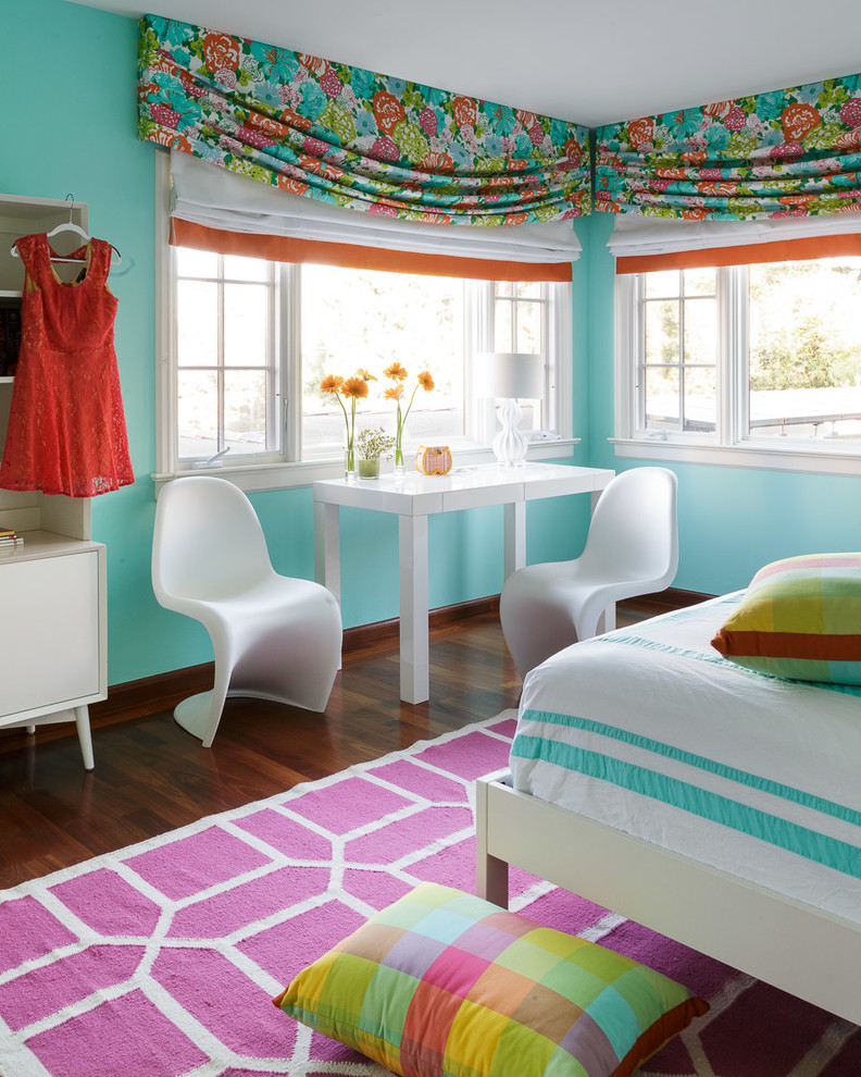 Example of a mid-sized trendy girl dark wood floor and brown floor kids' room design in San Francisco with blue walls