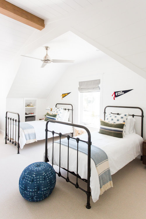 Medium sized beach style teen’s room for boys in Salt Lake City with white walls and medium hardwood flooring.