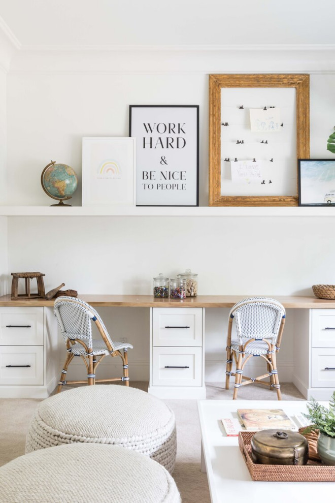 Beach style gender-neutral kids' study room photo in Orange County with white walls