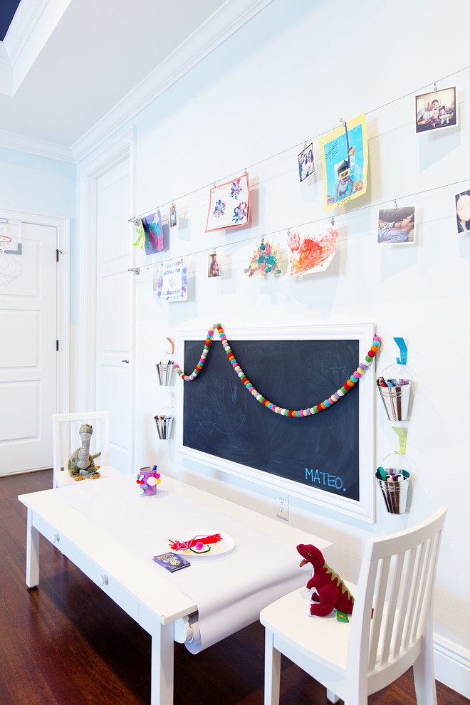 Kids' room - mid-sized transitional gender-neutral dark wood floor kids' room idea in Orlando with white walls