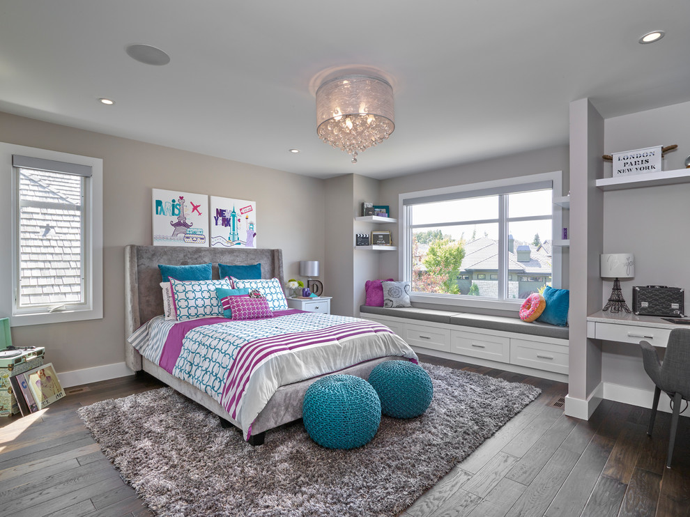 Photo of a traditional teen’s room for girls in Edmonton with grey walls, dark hardwood flooring and brown floors.