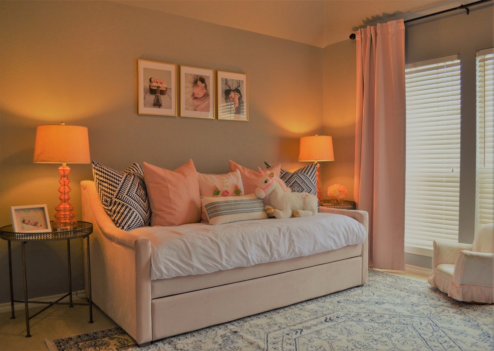 Medium sized classic children’s room for girls in Austin with grey walls, carpet and multi-coloured floors.