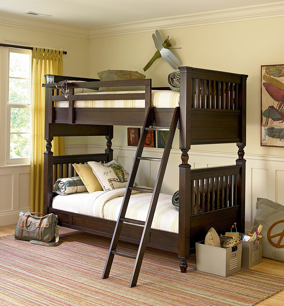 Example of a transitional boy light wood floor kids' room design in Indianapolis with beige walls