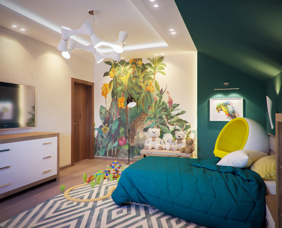 Cette photo montre une grande chambre d'enfant de 4 à 10 ans éclectique avec un mur vert et un sol en bois brun.