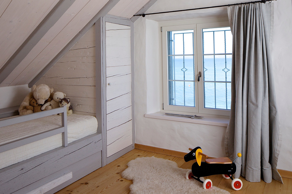 This is an example of a nautical kids' bedroom in Other.
