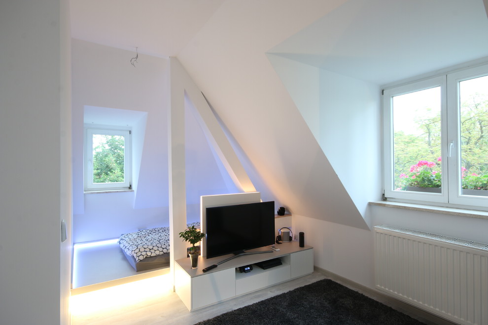 Example of a mid-sized trendy vinyl floor teen room design in Leipzig with white walls