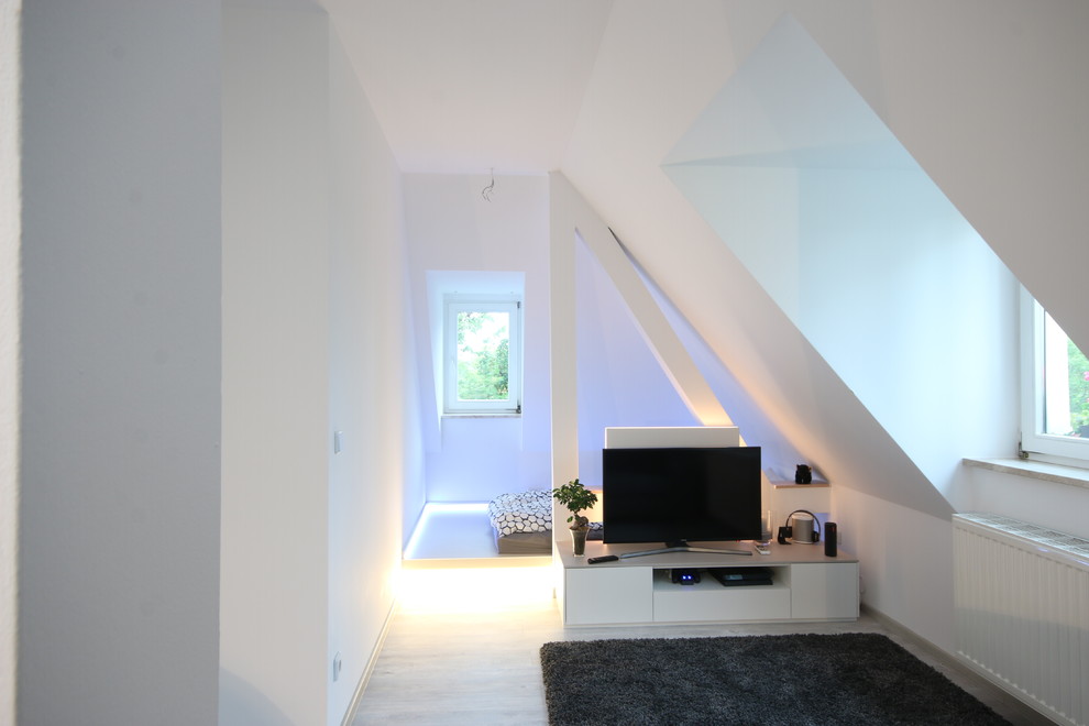 Design ideas for a medium sized contemporary teen’s room for boys in Leipzig with white walls and vinyl flooring.