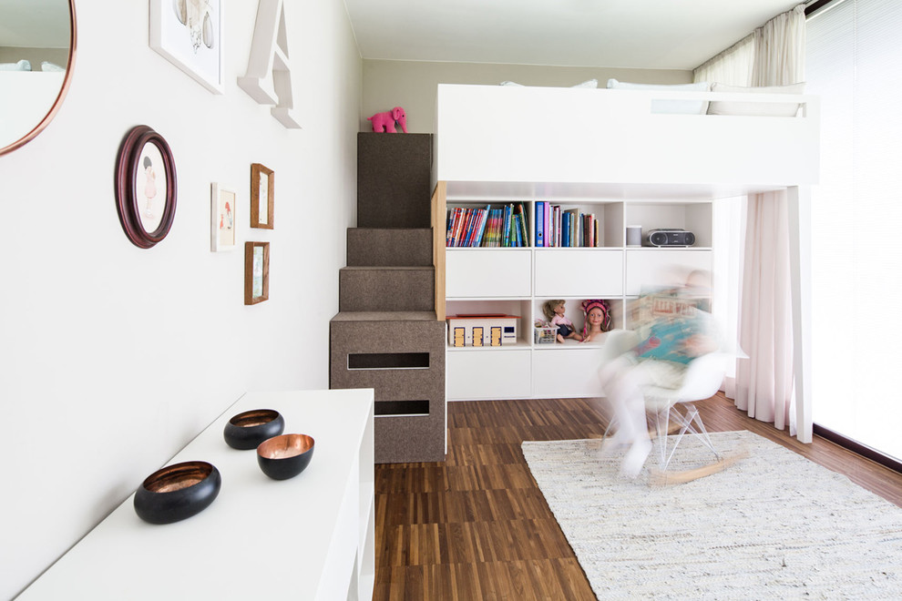 Kids' room - mid-sized scandinavian girl painted wood floor and brown floor kids' room idea in Munich with white walls
