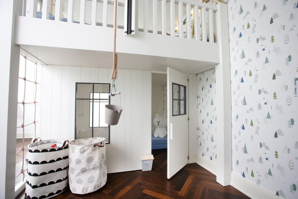 This is an example of a large contemporary kids' bedroom for boys in Hamburg with white walls, medium hardwood flooring and brown floors.