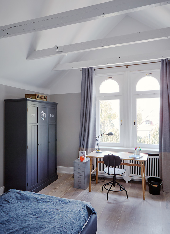 Photo of a medium sized contemporary kids' bedroom for boys in Hamburg.