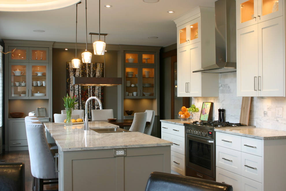 Inspiration for a contemporary galley eat-in kitchen remodel in London with white cabinets, white backsplash, stone tile backsplash and a double-bowl sink