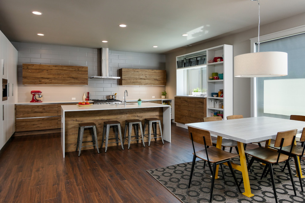 Photo of a contemporary kitchen in Seattle with flat-panel cabinets.