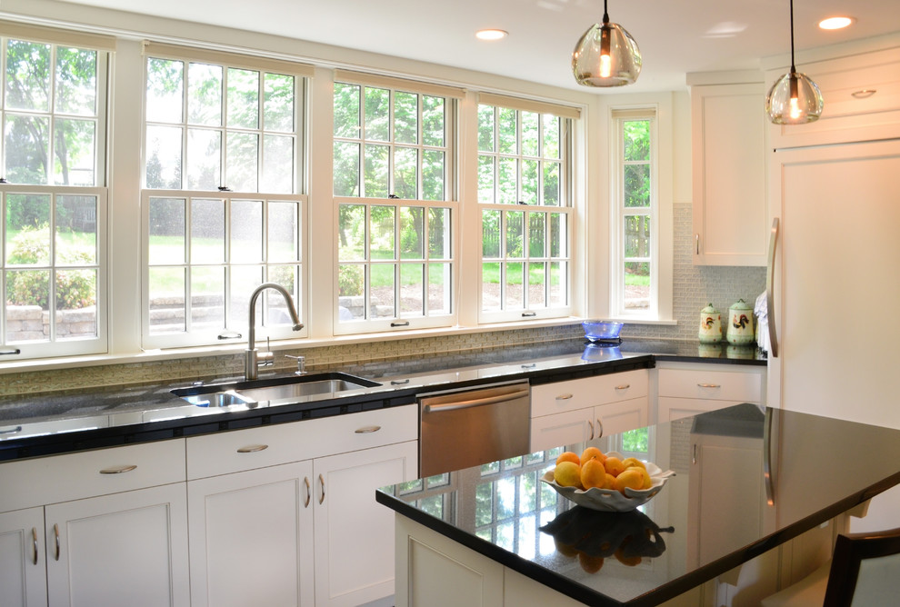 Eat-in kitchen - mid-sized modern u-shaped dark wood floor eat-in kitchen idea in Other with a double-bowl sink, shaker cabinets, white cabinets, granite countertops, metallic backsplash, metal backsplash, stainless steel appliances and an island