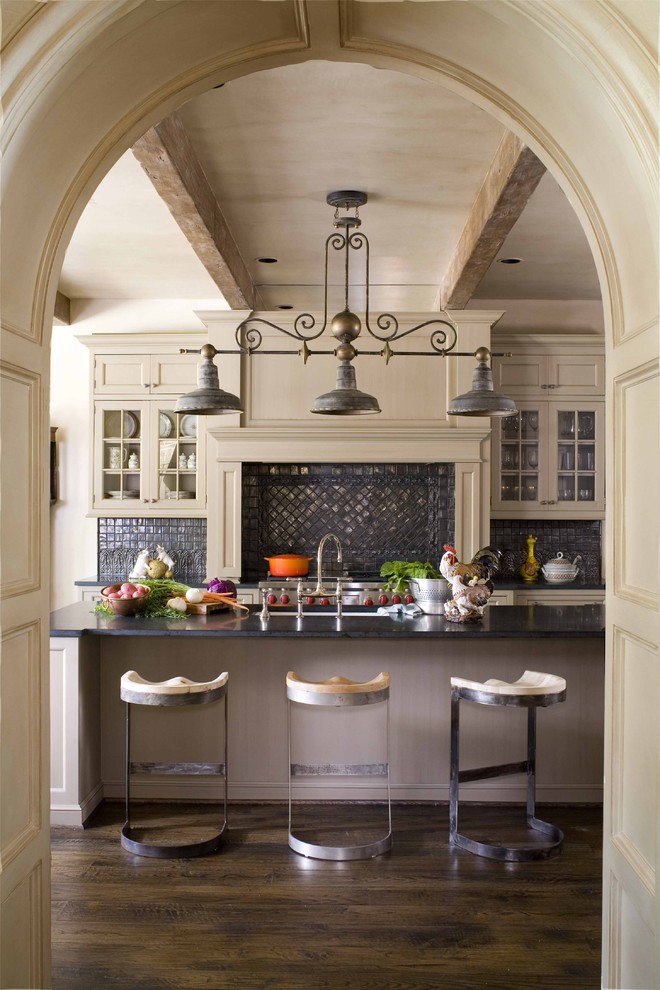 Inspiration for a traditional kitchen in Dallas with glass-front cabinets.