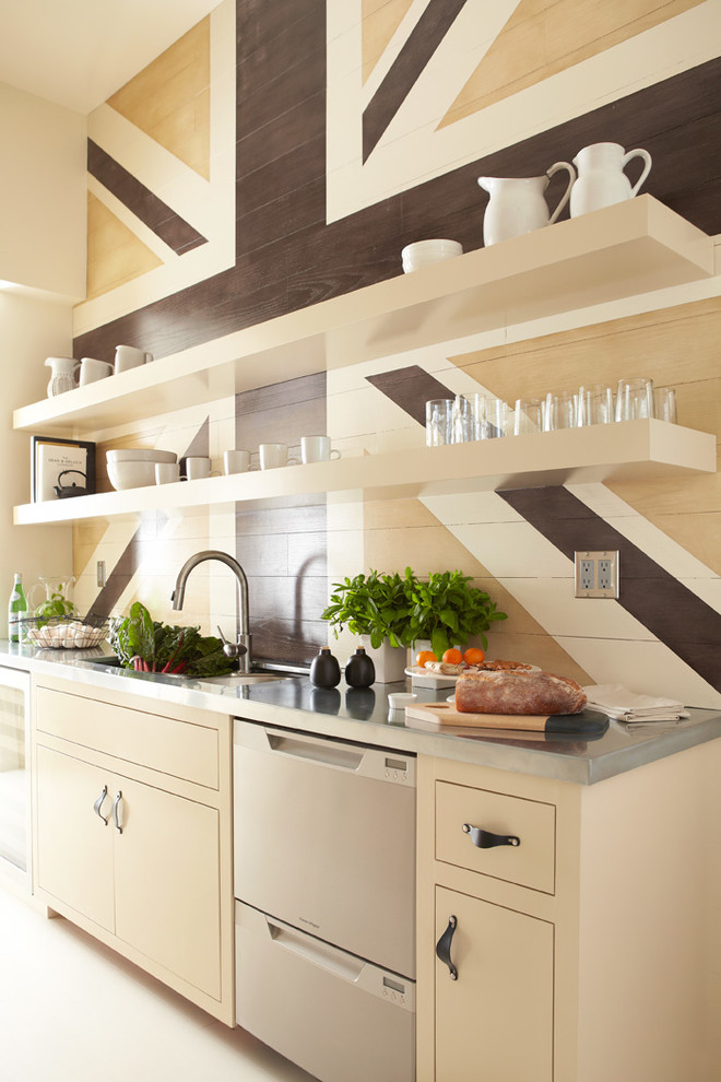 Idée de décoration pour une cuisine design avec un plan de travail en zinc.