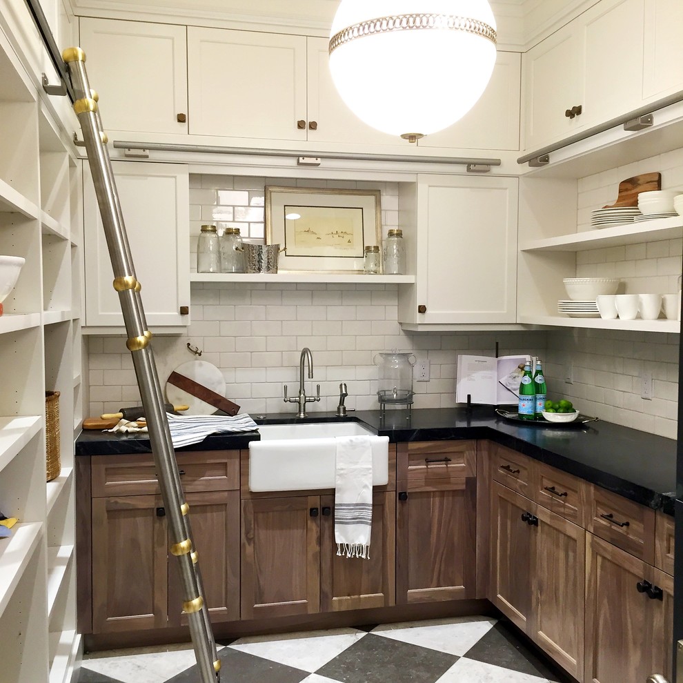 Large traditional galley kitchen pantry in Salt Lake City with a submerged sink, recessed-panel cabinets, white cabinets, marble worktops, white splashback, ceramic splashback, stainless steel appliances and ceramic flooring.