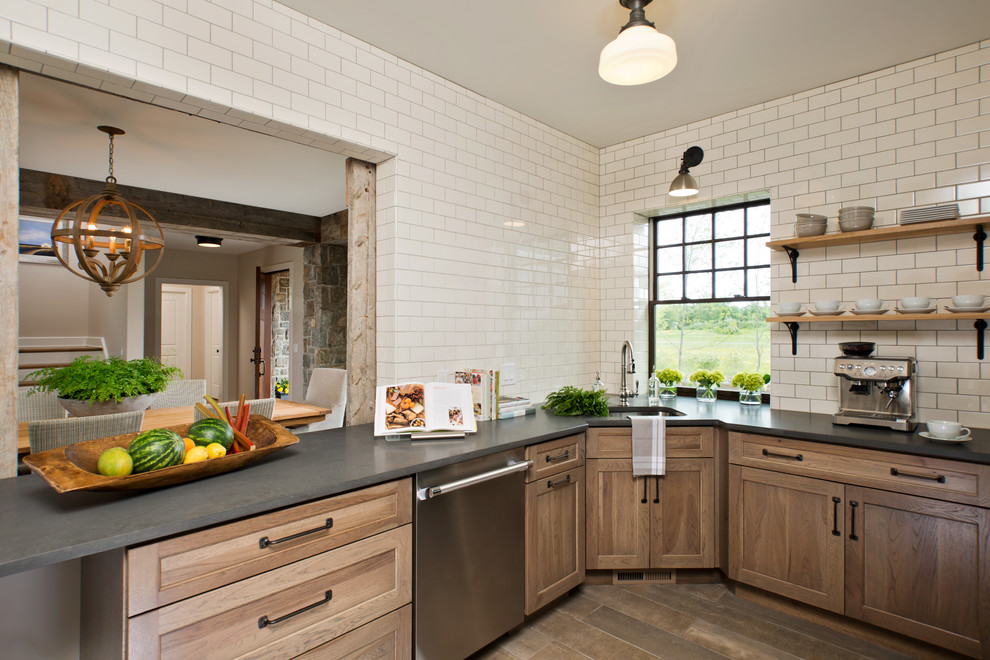 Example of a cottage dark wood floor kitchen design in New York with an undermount sink, shaker cabinets, medium tone wood cabinets, white backsplash and subway tile backsplash