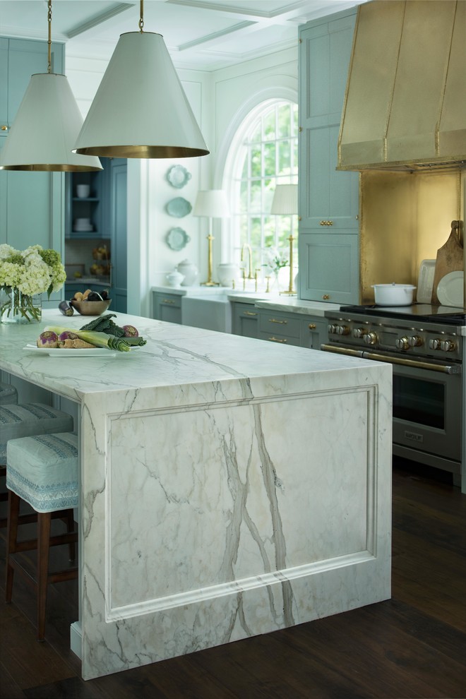 Kitchen - mid-sized transitional medium tone wood floor kitchen idea in Atlanta with marble countertops and an island