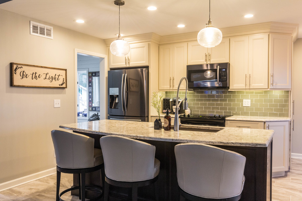 Small transitional single-wall light wood floor and brown floor eat-in kitchen photo in Detroit with an undermount sink, recessed-panel cabinets, white cabinets, quartz countertops, gray backsplash, glass tile backsplash, stainless steel appliances, an island and white countertops