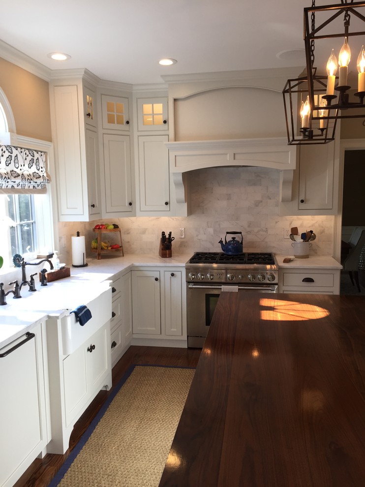 Inspiration for a traditional kitchen in Bridgeport with wood worktops and stainless steel appliances.