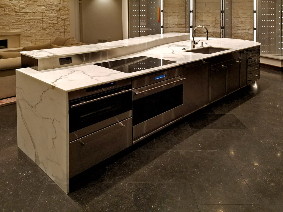 Inspiration for a large kitchen remodel in Denver with an undermount sink and marble countertops
