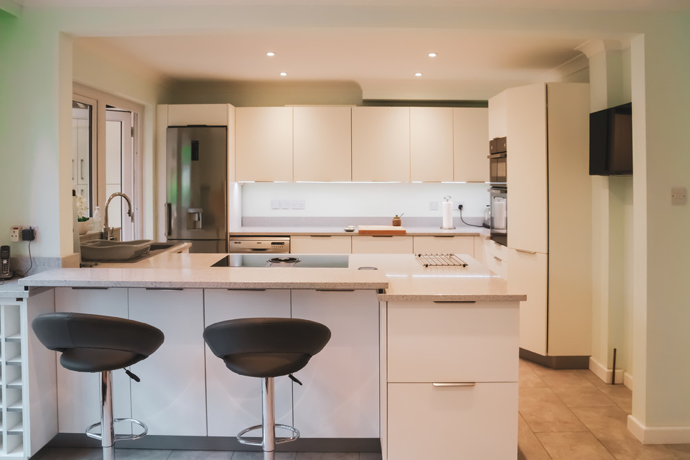 Example of a trendy kitchen design in Dorset