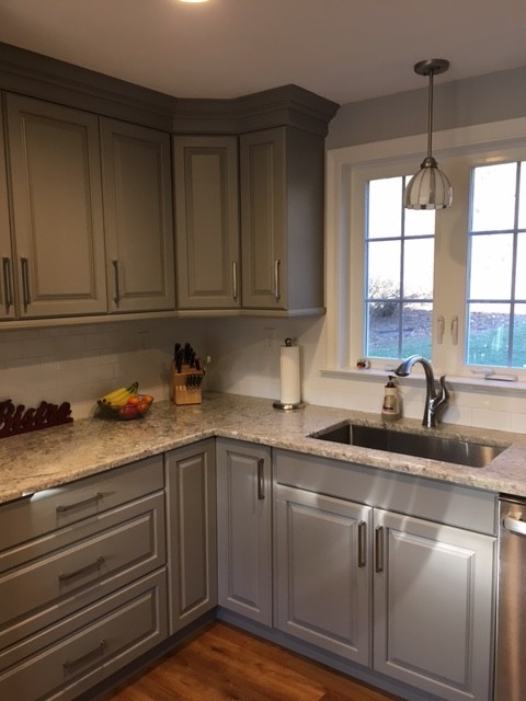 Design ideas for a traditional kitchen in Bridgeport with grey cabinets.