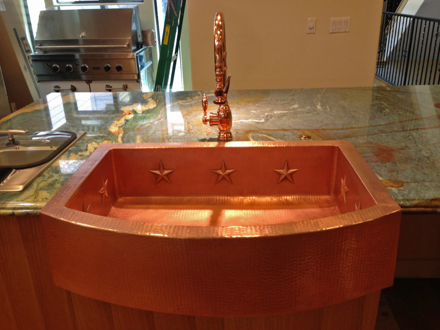 Photo of an eclectic kitchen in Seattle with a belfast sink.