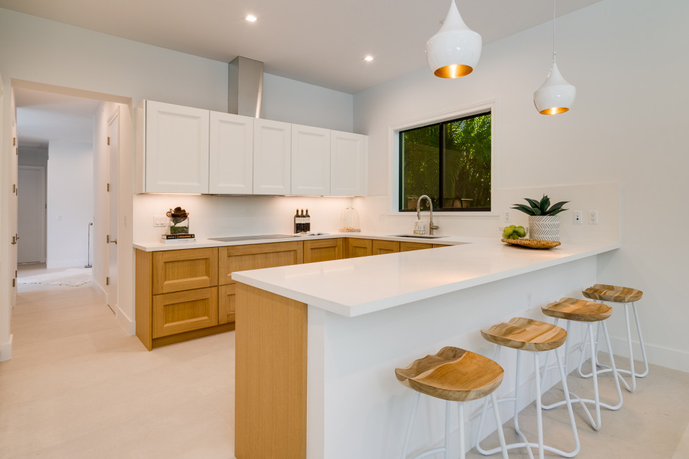 Example of a beach style kitchen design in Miami
