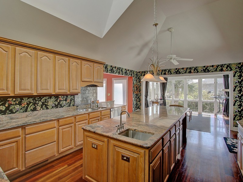 Kitchen in Charleston with granite worktops and stainless steel appliances.