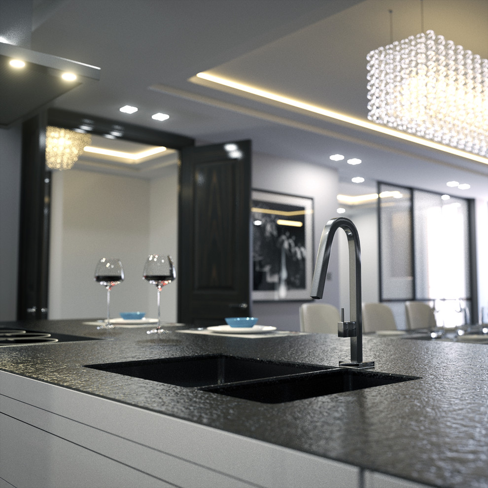 Foto di una cucina design con lavello sottopiano, ante lisce e ante bianche