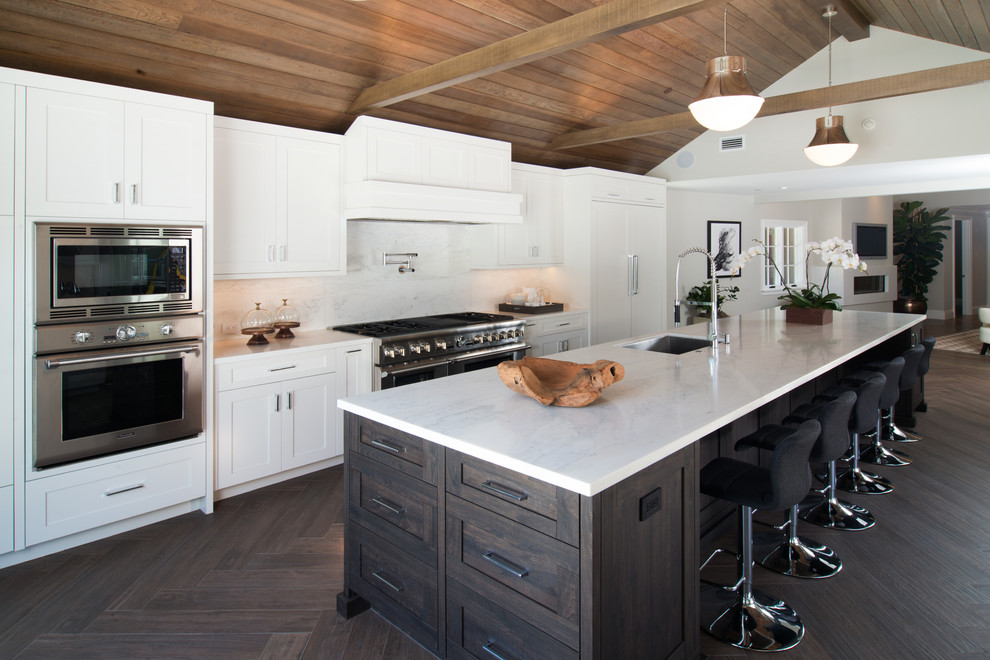 Photo of a classic kitchen in San Francisco with shaker cabinets and white cabinets.