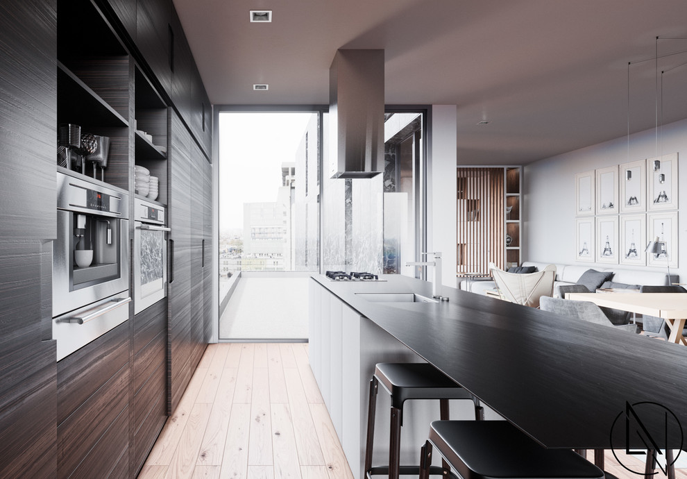 Idee per una grande cucina abitabile moderna con pavimento beige