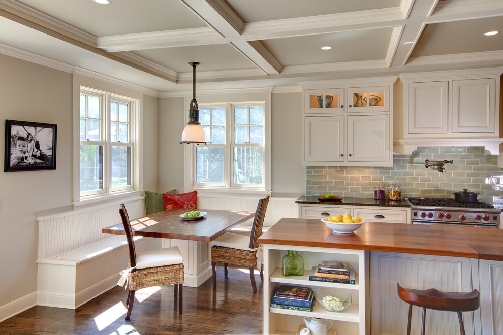Elegant kitchen photo in Austin with beaded inset cabinets, wood countertops, white cabinets, green backsplash and subway tile backsplash
