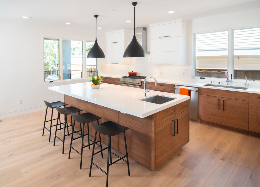 Inspiration for a contemporary l-shaped kitchen in San Francisco with flat-panel cabinets and medium wood cabinets.