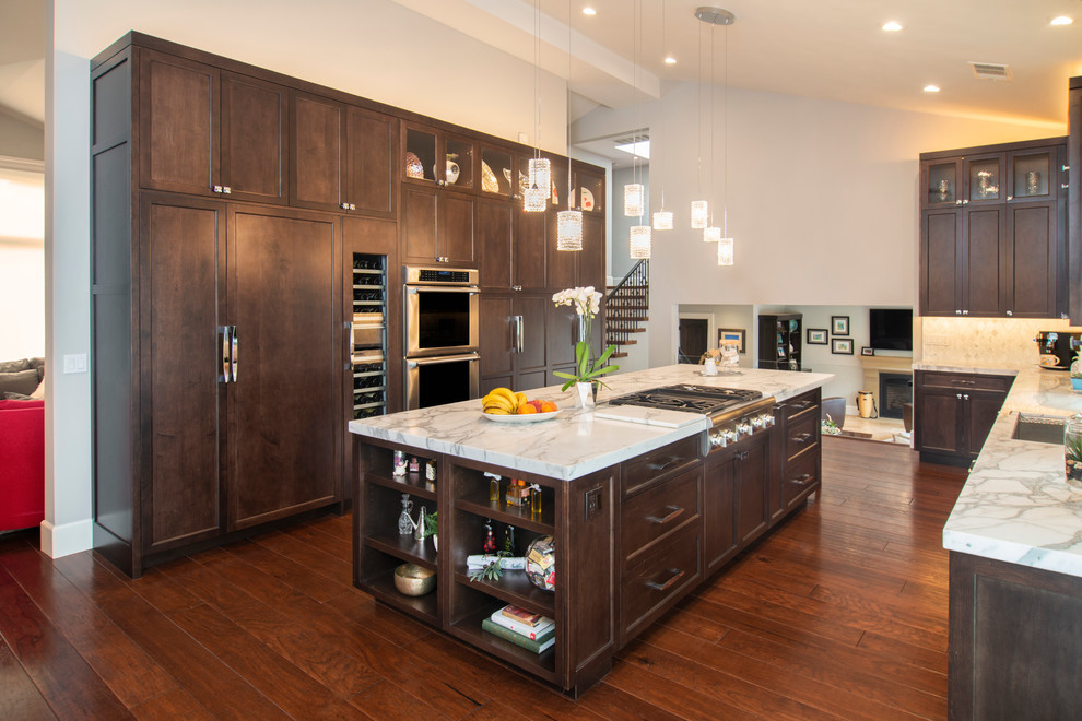 Photo of a classic kitchen in San Francisco with shaker cabinets and dark wood cabinets.