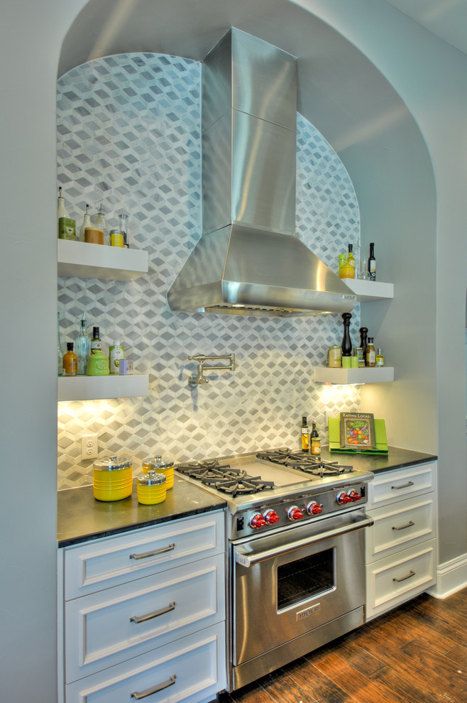 Inspiration for a large contemporary dark wood floor eat-in kitchen remodel in Austin with an undermount sink, shaker cabinets, white cabinets, granite countertops, gray backsplash, porcelain backsplash, white appliances and two islands