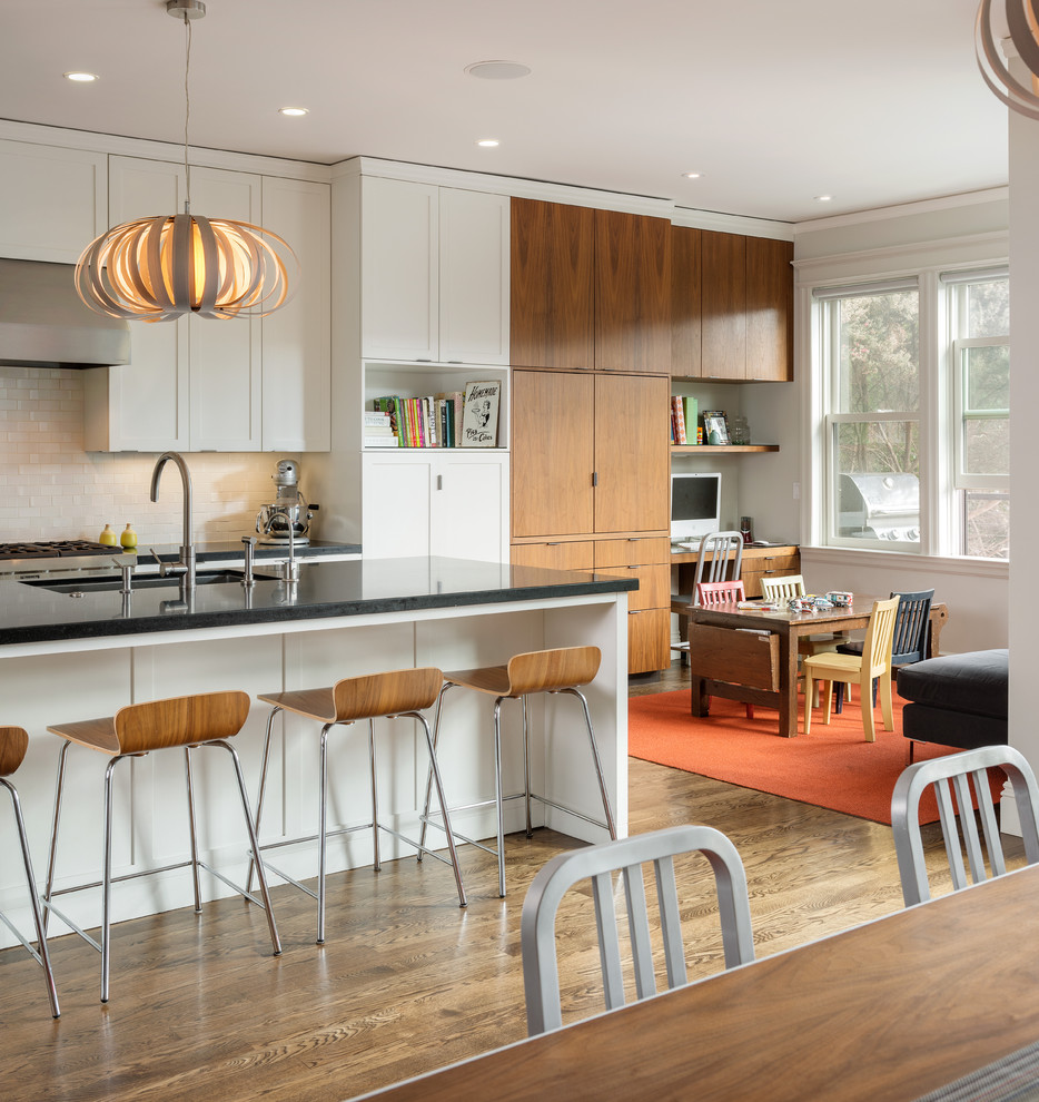 Inspiration for a contemporary eat-in kitchen remodel in San Francisco with an undermount sink, shaker cabinets, white cabinets and white backsplash