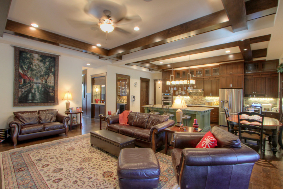 Kitchen - huge craftsman dark wood floor kitchen idea in Atlanta with a single-bowl sink, shaker cabinets, dark wood cabinets, granite countertops, glass tile backsplash, stainless steel appliances and an island