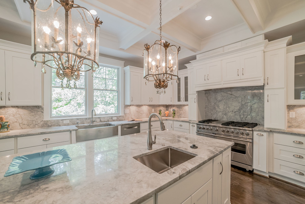 Inspiration for a timeless kitchen remodel in DC Metro with white cabinets, stainless steel appliances and an island