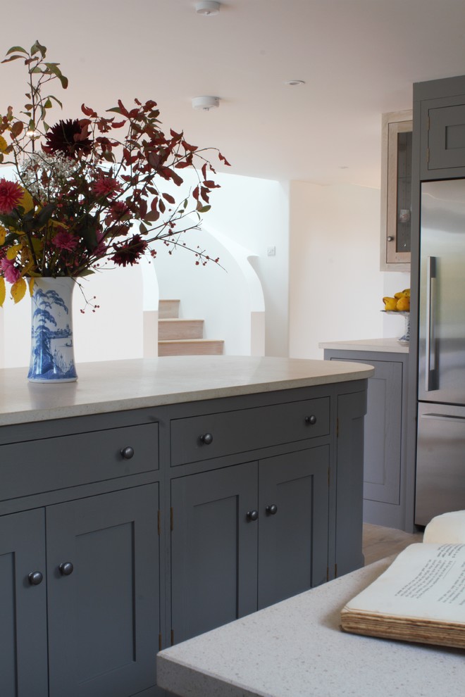 Mid-sized trendy u-shaped open concept kitchen photo in Other with shaker cabinets, gray cabinets, marble countertops, stainless steel appliances, an island and marble backsplash