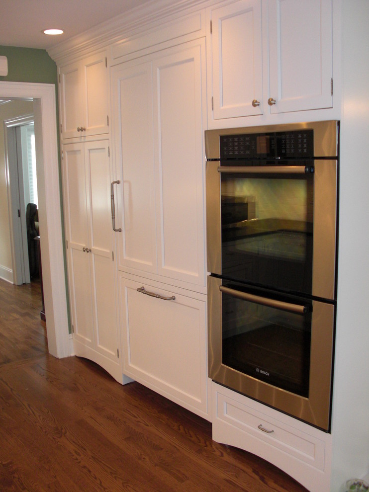 A Classic White Kitchen for a 1940's Home Transitional Kitchen