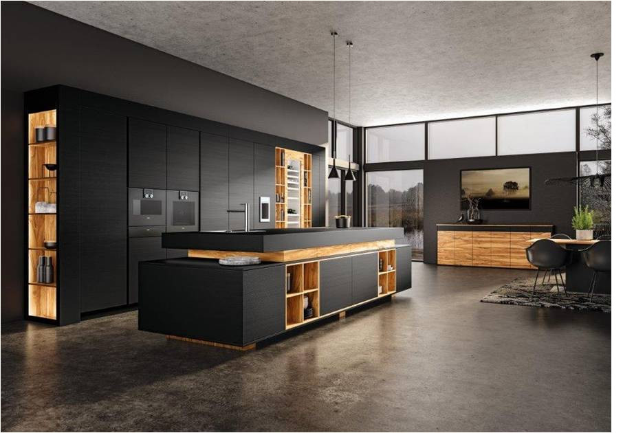 Inspiration for a huge modern galley concrete floor and gray floor eat-in kitchen remodel in Austin with a single-bowl sink, flat-panel cabinets, black cabinets, laminate countertops, black appliances, an island and black countertops