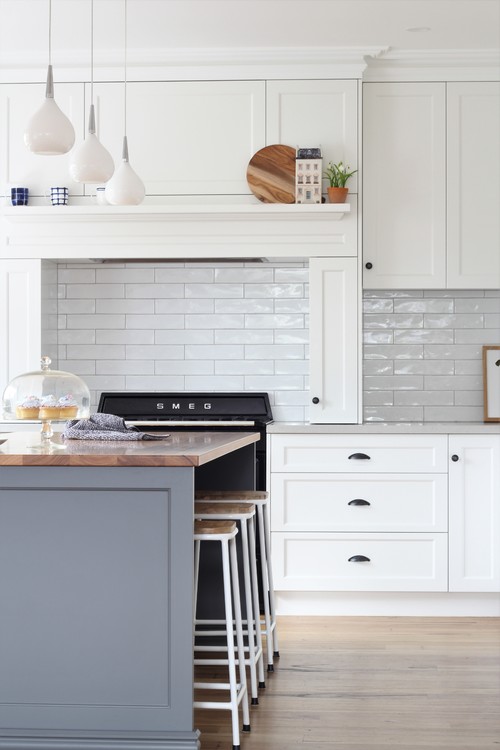 Glossy Elegance: White Modern Farmhouse Kitchen Ideas with Subway Tile Backsplash