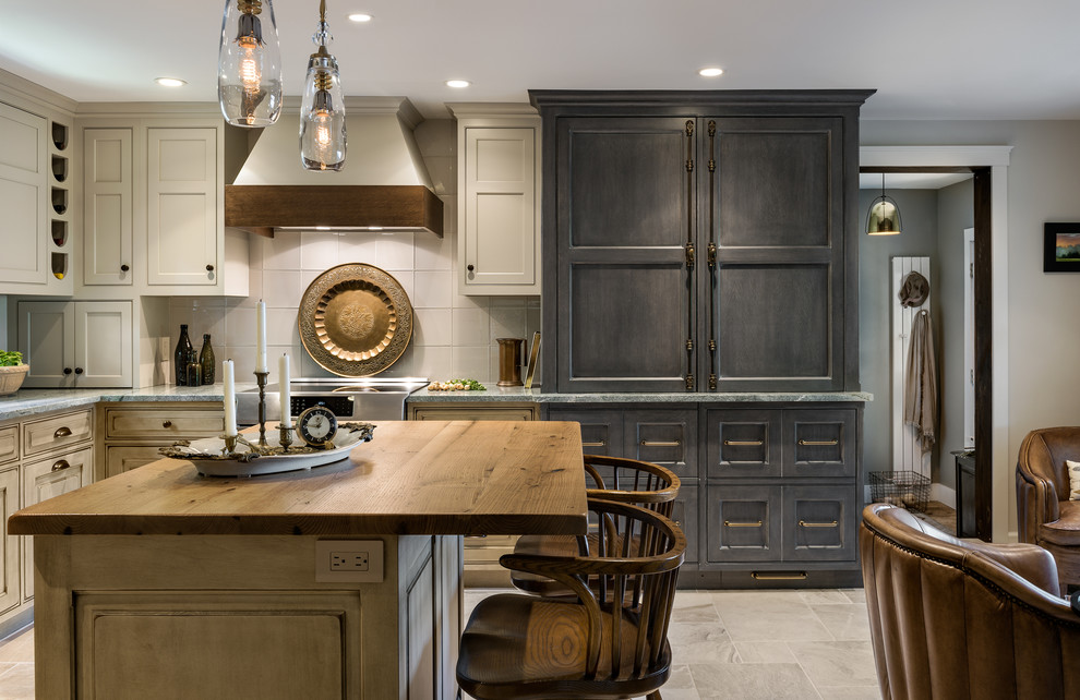 Transitional l-shaped kitchen photo in Boston with shaker cabinets, gray cabinets, stainless steel appliances and an island