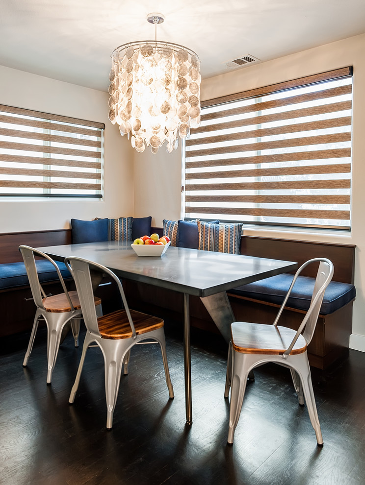Example of a large minimalist galley dark wood floor and brown floor enclosed kitchen design in Los Angeles with a farmhouse sink, flat-panel cabinets, dark wood cabinets, quartz countertops, white backsplash, stone slab backsplash, stainless steel appliances and no island
