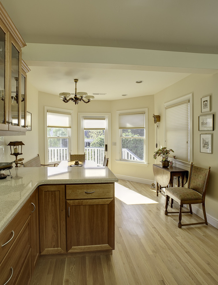 Kitchen - traditional kitchen idea in San Francisco with recessed-panel cabinets and medium tone wood cabinets