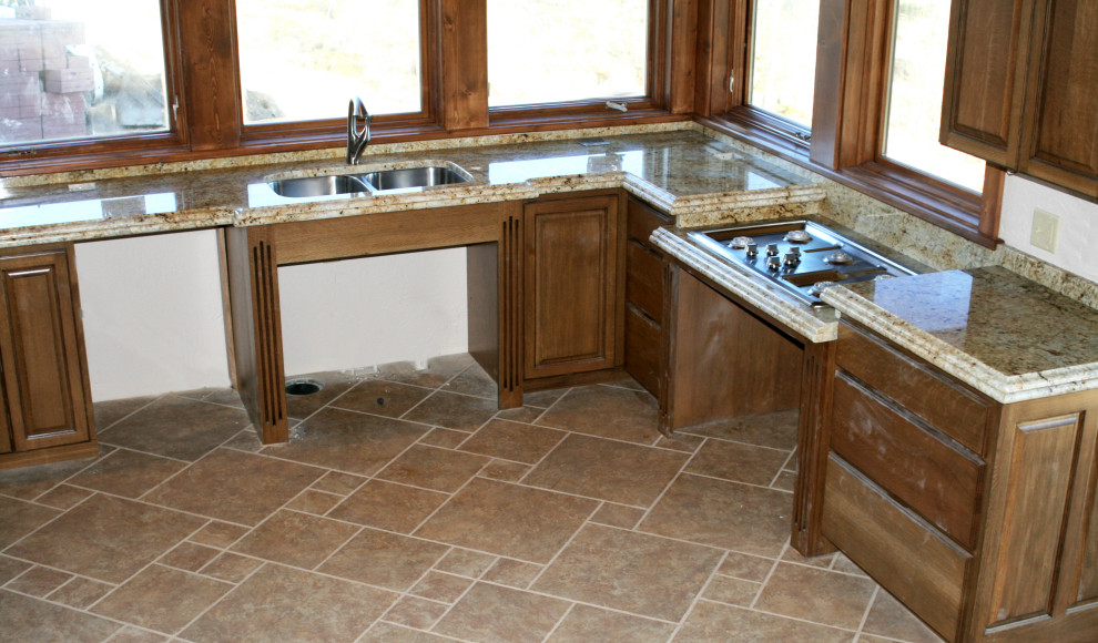 This is an example of a rustic kitchen in Denver.